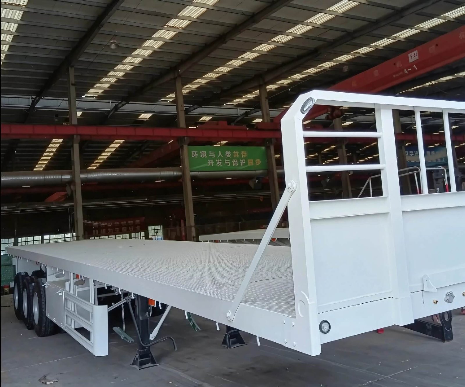 20ft – 53ft Tri Axle Flatbed Trailer for Sale in Tanzania - Image 2